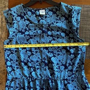 Perfect Spring and Summer dress!! So comfortable! Buttons in the front!